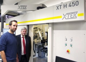 People viewing a 3D CT machine