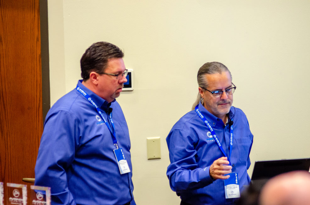 Avonix employees presenting at A-Tec